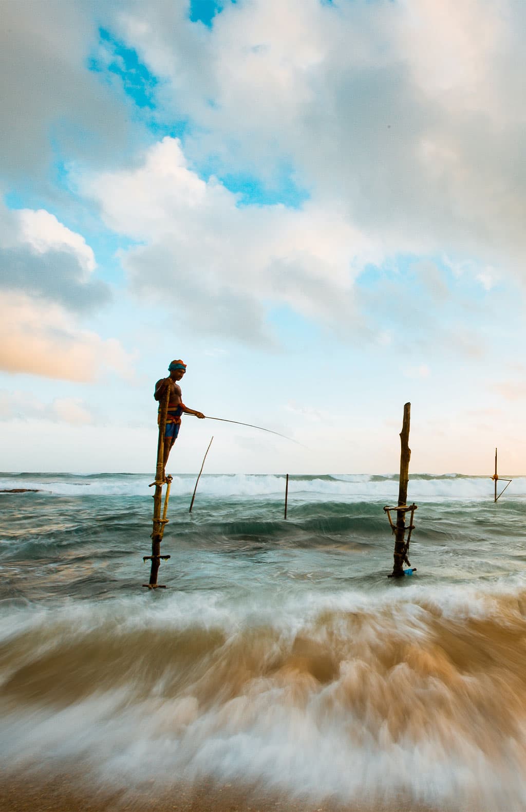 Iconic stilt fishermans in Hikkaduwa, Sri Lanka.